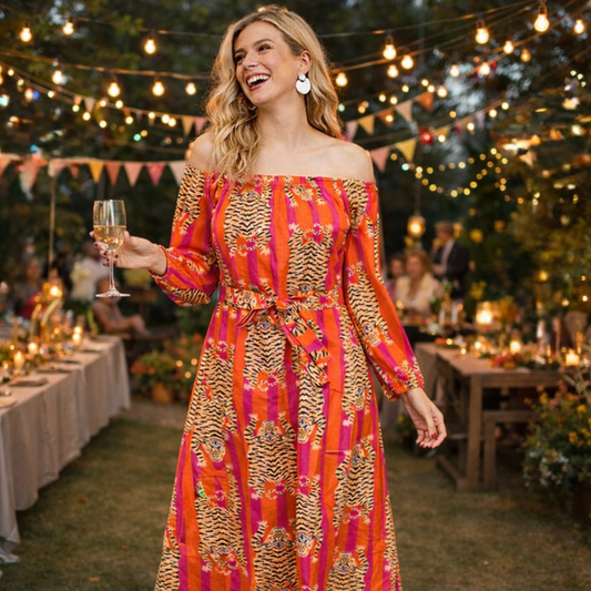 tiger tango off-shoulder orange block print midi dress. Amranis.